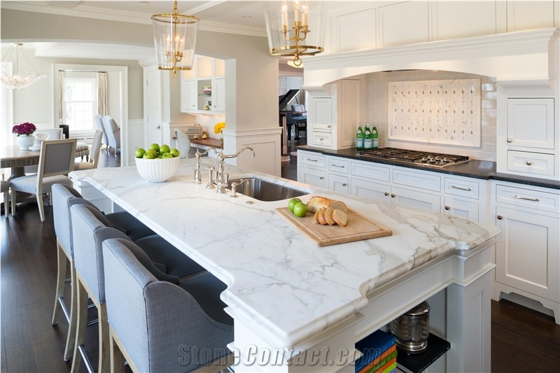 Calcutta Gold Honed with an Ogee Edge Kitchen Island Top, Via Lactea Honed Perimeter Countertop