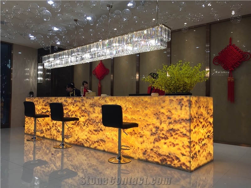 Peacock Onyx Slab for Reception Countertop and Wall Panel Book Match