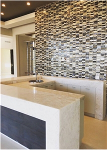 Quartzite Bianco Countertops Paired with The"Salsa Mosaic" by Dune