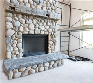 River Rock Muskoka Stone Fireplace and Oversized Flagstone Hearth River Rock Muskoka Stone Fireplace and Oversized Flagstone Hearth