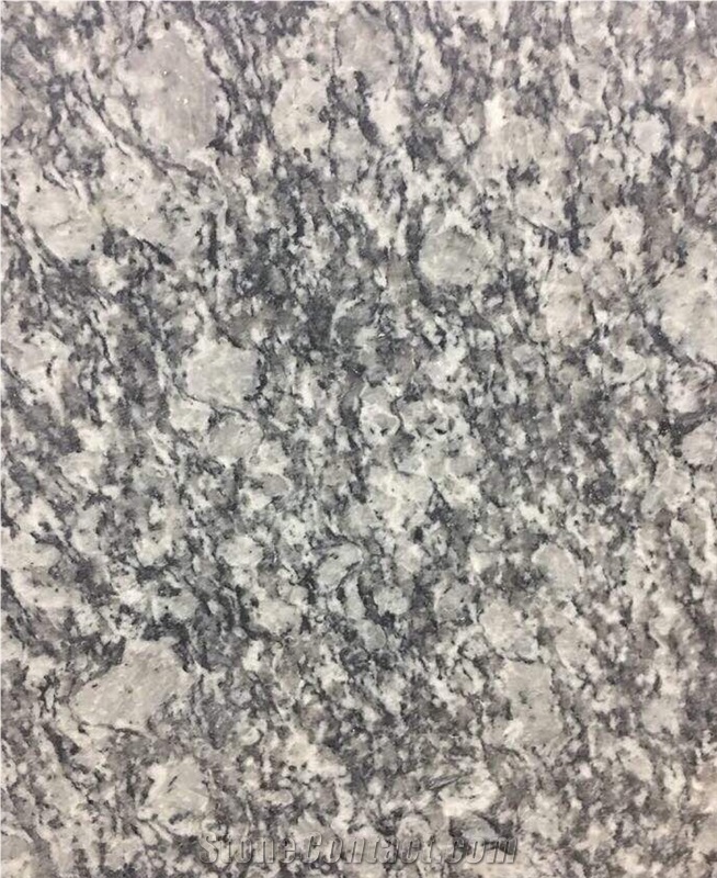 Spray White Granite Slabs & Tiles