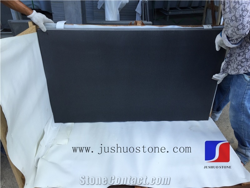 Hainan Black Basalt Tiles & Slabs with Honeycomb,Black Andesitem in Machine Cut, Black Lava Stone,Sawn Cut Stone,Hainan Bluestone,Curbstone,Bevel Edge Curbs,Building Stone