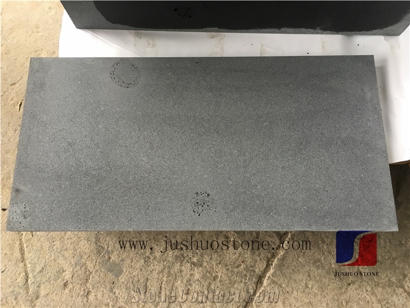 Hainan Black Basalt Tiles & Slabs with Honeycomb,Black Andesitem in Machine Cut, Black Lava Stone,Sawn Cut Stone,Hainan Bluestone,Curbstone,Bevel Edge Curbs,Building Stone