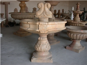 Yellow Marble Fountain with Fish Sculpture