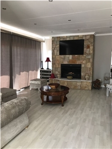 Sandstone Masonry Traditional Fireplace with White Marble Hearth