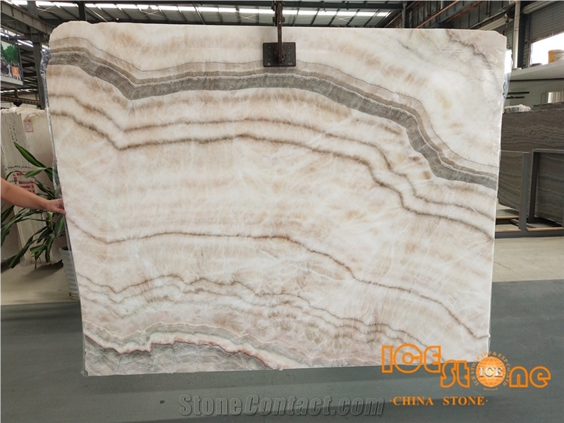 China Large Quantity Bookmatched Perfect Transpancy Beige Onyx