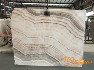China Large Quantity Bookmatched Perfect Transpancy Beige Onyx