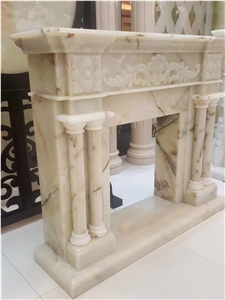 White Onyx Sculptured Fireplace