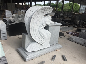 G633 Light Gray Monument with Angel Kneeling