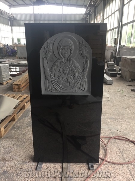 Shanxi a Black Granite Monument with Saint Carving on Front