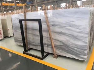 Cloudy White Tiles and Slabs