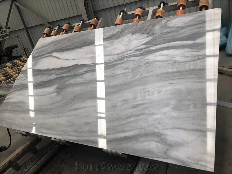 Cloudy White Tiles and Slabs