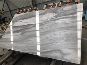 Cloudy White Tiles and Slabs