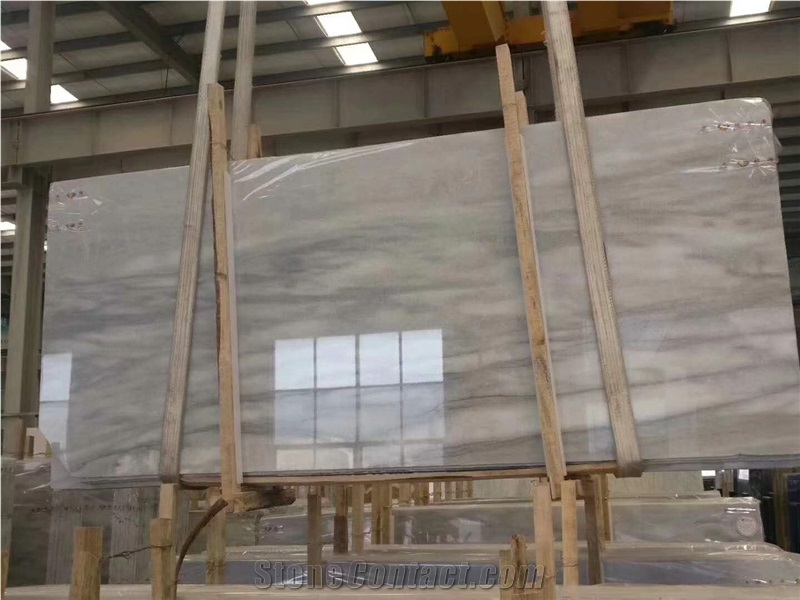 Cloudy White Tiles and Slabs