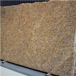 Giallo Santa Cecilia Dark Granite Slabs