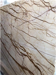Rich Gold Marble Dragon Sofitel Crema Evita Slab