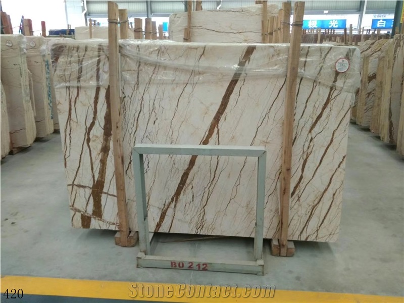 Rich Gold Marble Dragon Sofitel Crema Evita Slab