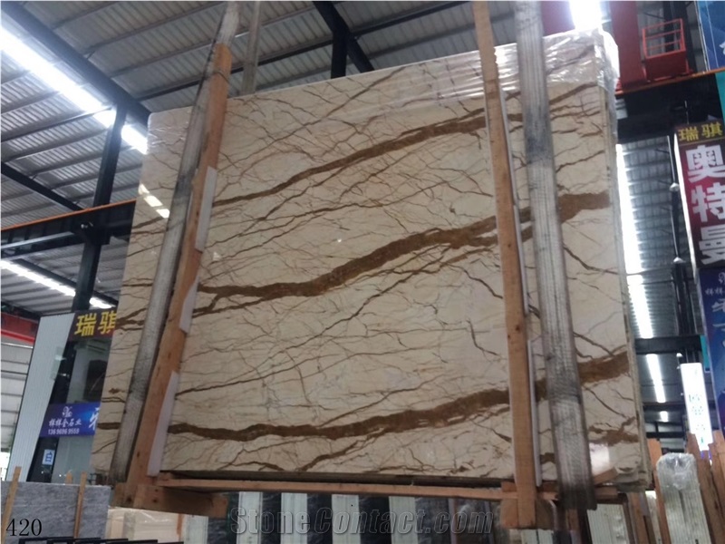 Rich Gold Marble Dragon Sofitel Crema Evita Slab
