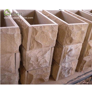 Rosy Brown Retaining Panel Fence Mushroomed Stone