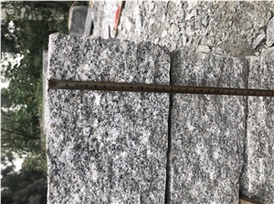 G603 New Grey Granite Picked Cleft Kerbstone