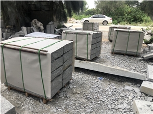 G603 New Grey Granite Picked Cleft Kerbstone