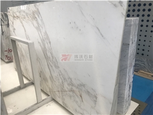 Calcutta Gold Marble Book Matching Pattern Slabs