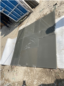 Natural Buff Circle, Natural Raj Green, Kandala Grey Sawn Honed