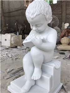 Little Angel Boy Reading a Marble Sculpture
