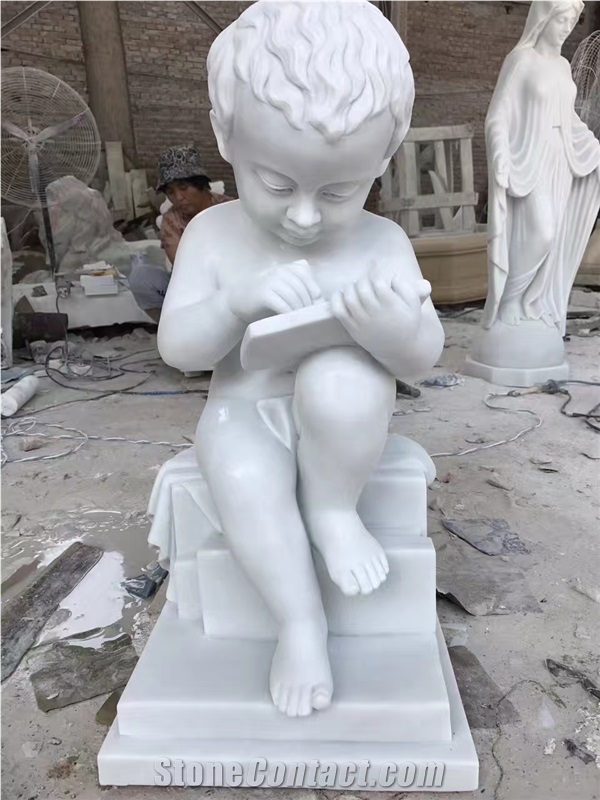 Little Angel Boy Reading a Marble Sculpture