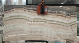 Light through Beige Wooden Veins Onyx Slab