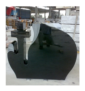 Black Shaped Headstone with Cross in Its Cut-Out