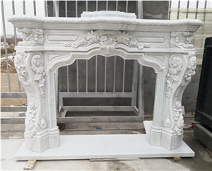 Hand Carved White Marble Fireplaces