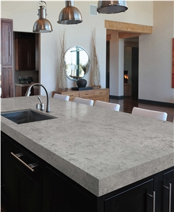 Artificial Grey Cutting a Quartz Slab Kitchen
