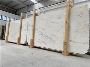 Cream Estremoz Marble, White Michelangelo Slabs