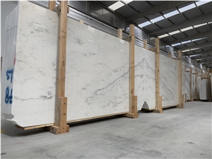Cream Estremoz Marble, White Michelangelo Slabs