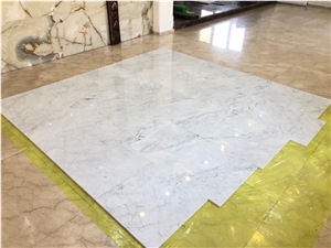 Wavy White Marble Slabs and Tiles