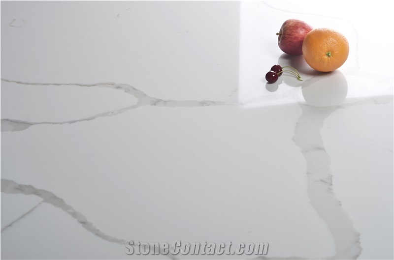 Bookmatched Veins in White Calacatta Quartz Slab