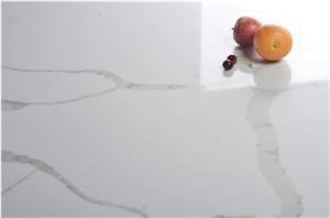 Bookmatched Veins in White Calacatta Quartz Slab
