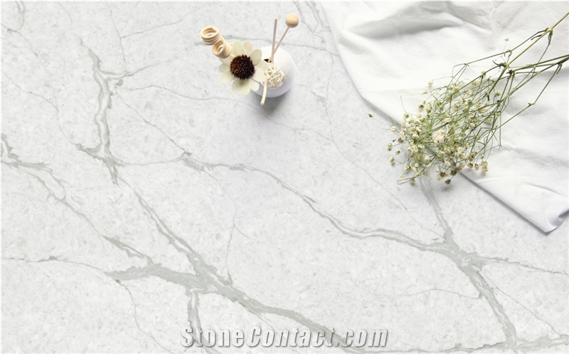Bookmatched Veins in White Calacatta Quartz Slab