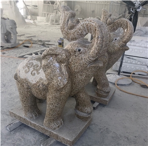 Yellow Golden Granite Snubby Nose Elephant Carving