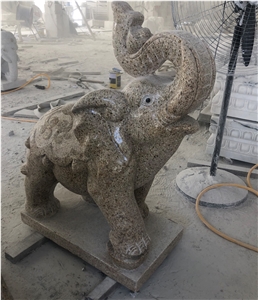 Yellow Golden Granite Snubby Nose Elephant Carving