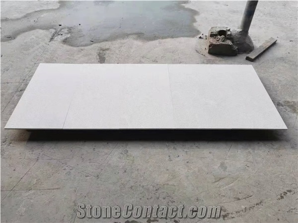 Pure White Marble Pool Cap and Surrounding Tile