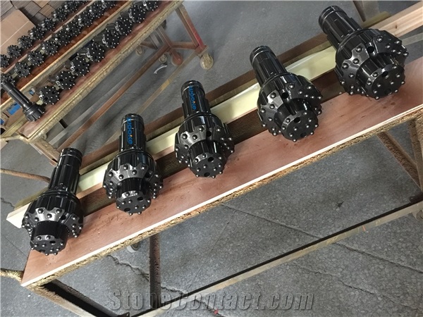 Symmetric Overburden Casing System Drilling Tools