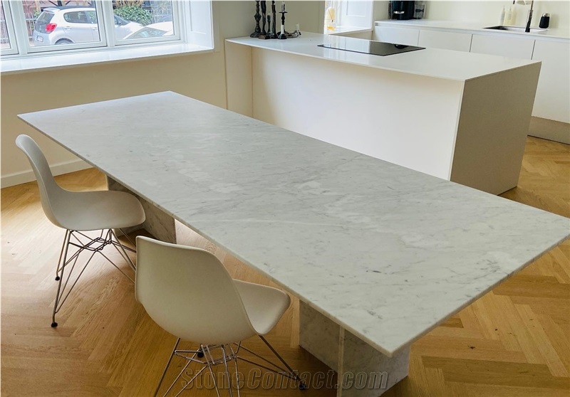 Dining table in Carrara white marble