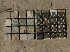 Multicolor Quartzite Cobbles On Mesh