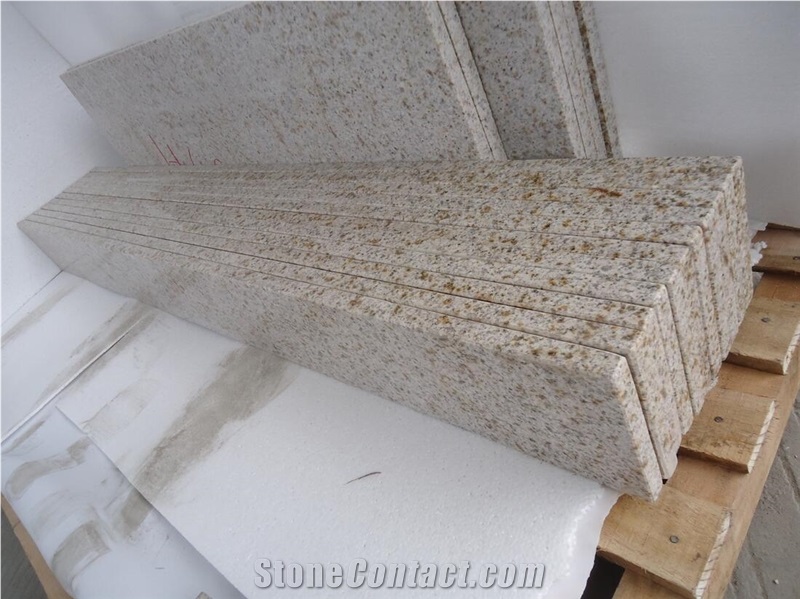 Rusty Yellow Granite Countertop And Backsplash 