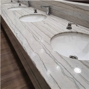 White Macaubas Quartzite In A Commercial Bathroom