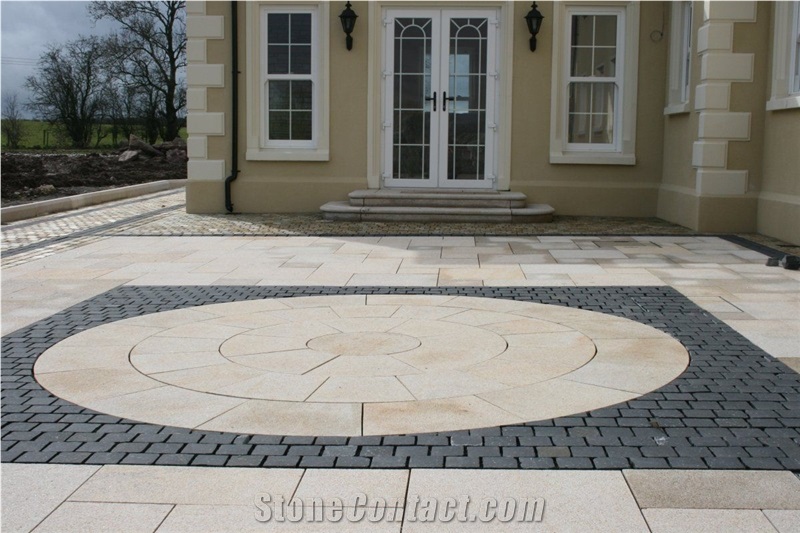 Gold Granite Circle With Black Granite Cobble Stone Patio