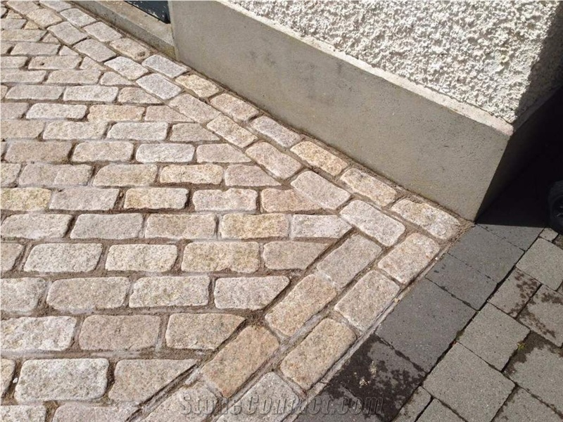 Gold Granite Circle With Black Granite Cobble Stone Patio