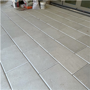 Texas White Limestone Pillowed Edge Floor Tiles